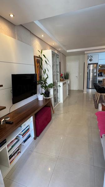 Apartamento de 2 dormitórios (suíte) e garagem em Coqueiros.