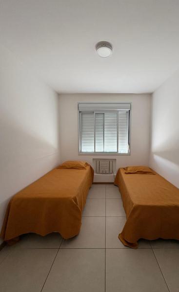 Apartamento  de 2 dormitórios  sendo 1 suíte, sacada e garagem especial no Abraão.